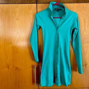 Cool green mini dress. Never worn. 95% Cotton and 5% Elastane.